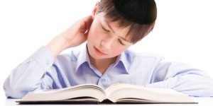 boy with book on white background